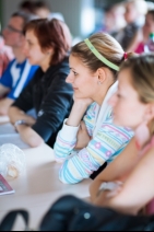 College Students in class sitting at a desk